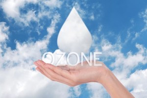 Hand holding a drop of ozone